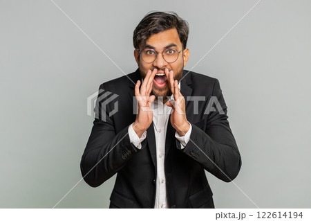 Indian businessman whisper news rumors holding hands near mouth, share gossip quiet, keep my secrets 122614194