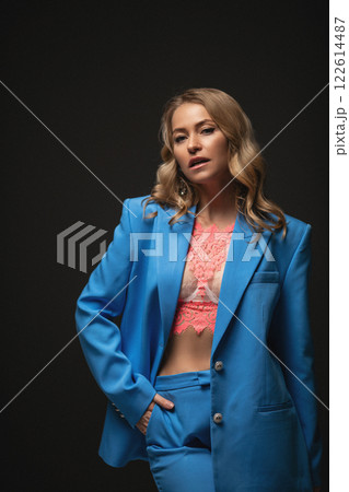 Beautiful stylish woman in a blue suit with Beautiful stylish woman in a blue suit with 122614487