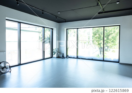 Modern apartment with big windows empty interior space designed in minimalism Modern apartment with big windows empty interior space designed in minimalism 122615869