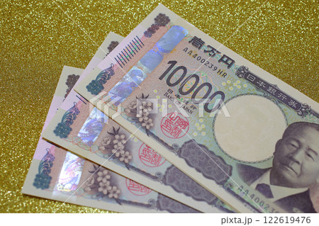 一万円札 日本円金色の背景 一万円札 日本円金色の背景 122619476