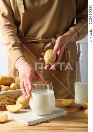 Potato milk, concept of fresh and healthy drink Potato milk, concept of fresh and healthy drink 122619580