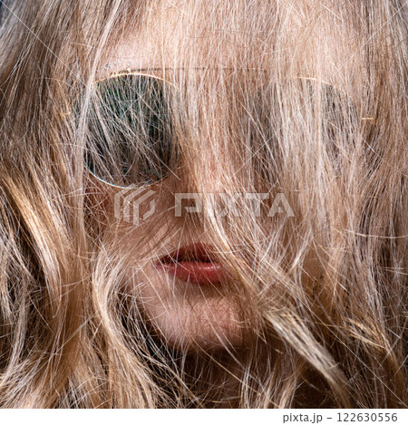 Abstract woman portrait with hairs on her face Abstract woman portrait with hairs on her face 122630556
