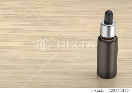 Dropper bottle on wooden desk Dropper bottle on wooden desk 122631399