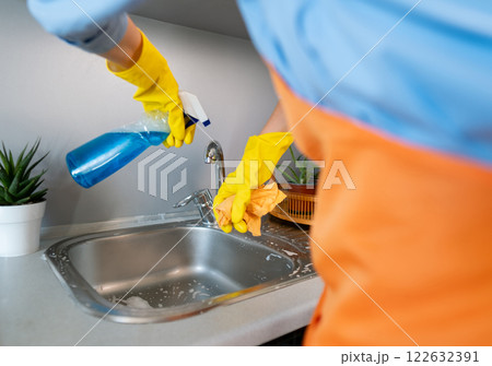 Professional cleaners have the tools and equipment to reach areas that are difficult to access with regular cleaning methods. Professional cleaners have the tools and equipment to reach areas that are difficult to access with regular cleaning methods. 122632391