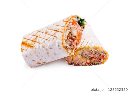 Delicious grilled burrito filled with seasoned beef, fresh vegetables, and creamy sauce ready to tempt your taste buds 122632520