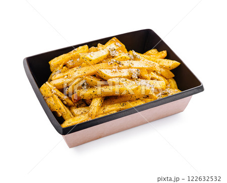 Crispy seasoned fries served in a black container ready to be enjoyed as a delicious snack or side dish Crispy seasoned fries served in a black container ready to be enjoyed as a delicious snack or side dish 122632532