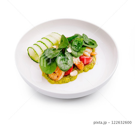 Delicious seafood dish with fresh vegetables and herbs served in a stylish bowl Delicious seafood dish with fresh vegetables and herbs served in a stylish bowl 122632600