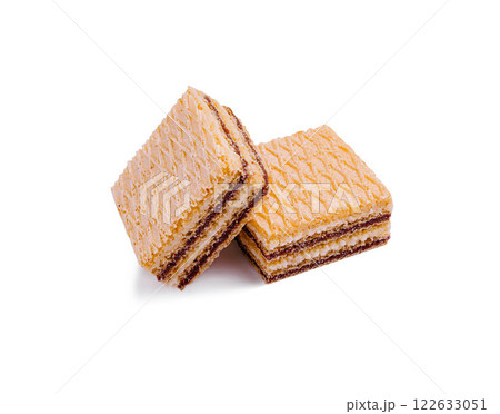 Delicious layered cakes are stacked together, showcasing alternating flavors and textures in a tempting dessert display Delicious layered cakes are stacked together, showcasing alternating flavors and textures in a tempting dessert display 122633051