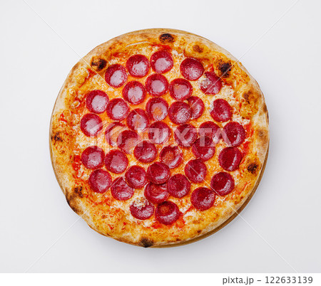 Freshly baked pepperoni pizza ready to be served at a cozy restaurant 122633139