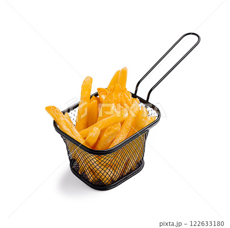 Crispy golden fries served in a small wire basket ready to enjoy Crispy golden fries served in a small wire basket ready to enjoy 122633180