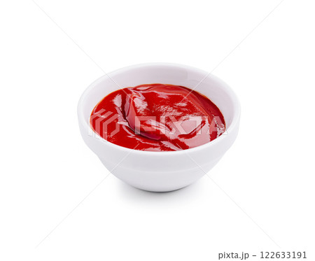 Fresh red ketchup in a white bowl ready for serving at a casual meal setting Fresh red ketchup in a white bowl ready for serving at a casual meal setting 122633191