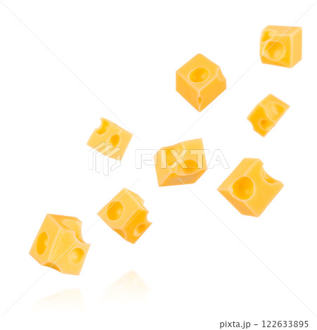 Pieces of cheese flying. Cheese cubes with holes levitating in air isolated on white background Pieces of cheese flying. Cheese cubes with holes levitating in air isolated on white background 122633895