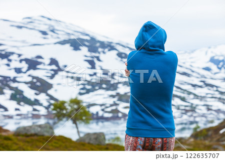 Tourist woman in mountains Norway Tourist woman in mountains Norway 122635707