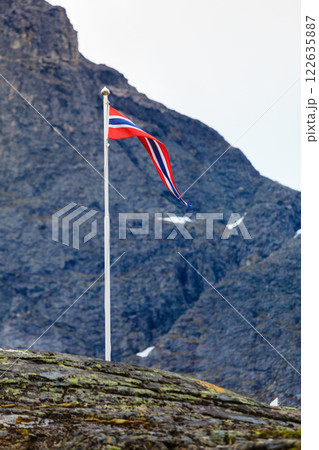 norwegian flag in rocky mountains 122635887