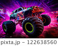 Neon-Lit Monster Truck in Action in Mid-Air 122638560