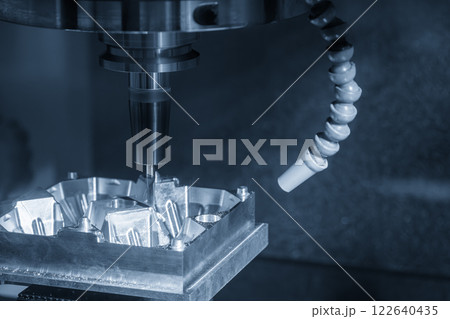 The CNC milling machine cutting blow mold part by solid ball end mill tool. The CNC milling machine cutting blow mold part by solid ball end mill tool. 122640435