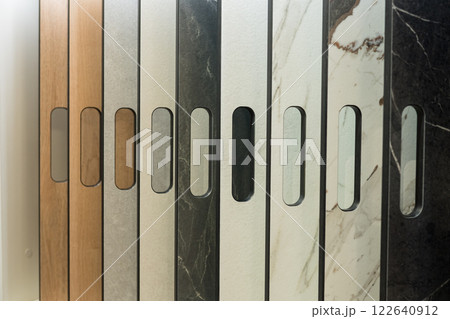 Variety of laminate and marble cabinet surface textures 122640912