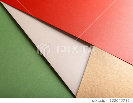 Festive wrapping paper with a glossy texture in red, green, and white, elegant and decorative 122643752