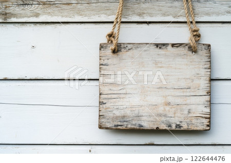 Wooden Signboard with Rope. Wood sign board template. Hanging notice board with empty white space. Blank rustic textured vintage board. Timber mock-up, customizable surface. Retro Style Ancient Sign. 122644476