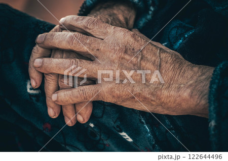 Close-up of a Well-Worn Hands Resting Peacefully 122644496