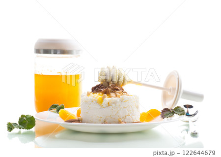 Healthy cottage cheese dessert with nuts and dried fruits 122644679