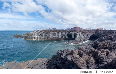 Rugged Coastal Landscape with Volcanic Rock Formations 122645962
