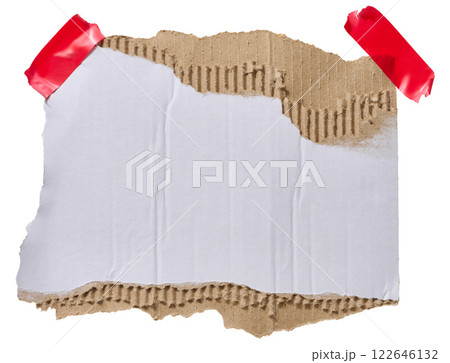 Torn piece of white corrugated cardboard attached to red piece of electrical tape, isolated background 122646132