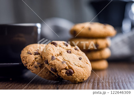 Chocolate chip cookies on wooden table. 122646309
