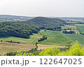 Breathtaking View of the Lush Hills and Expansive Fields in a Sunny Landscape.  Breathtaking View of the Lush Hills and Expansive Fields in a Sunny Landscape.  122647025