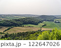 Breathtaking View of the Lush Hills and Expansive Fields in a Sunny Landscape.  Breathtaking View of the Lush Hills and Expansive Fields in a Sunny Landscape.  122647026