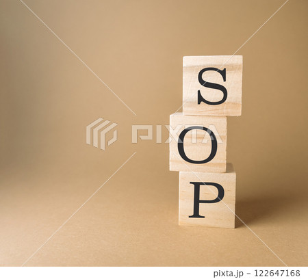 Stack of wooden blocks with the letters SOP on top Stack of wooden blocks with the letters SOP on top 122647168