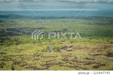 Panoramic view of a road surrounded by vegetation, Landscape of an urban road surrounded by vegetation, View of an urban road surrounded by vegetation 122647745