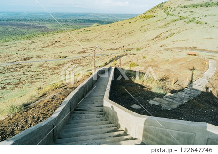 High angle of long concrete stairs outside with nature background. Long concrete stairs on a beautiful hill. Long stairs leading to the viewpoint of the Masaya volcano, Nicaragua 122647746