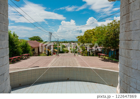 View of the streets of Nagarote with a view of the Momotombo volcano, Nicaragua. Streets of Nagarote with a view of the momotombo volcano on a suny day View of the streets of Nagarote with a view of the Momotombo volcano, Nicaragua. Streets of Nagarote with a view of the momotombo volcano on a suny day 122647869