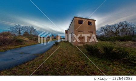 Abandoned village of Wollseifen at dusk with dramatic sky and historic ruins 122648088
