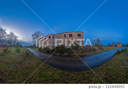 Abandoned village of Wollseifen at dusk with dramatic sky and historic ruins 122648091