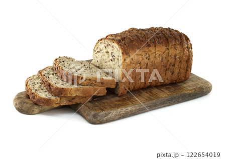 Sliced Multigrain Bread on Wooden Cutting Board Isolated on White Background Sliced Multigrain Bread on Wooden Cutting Board Isolated on White Background 122654019