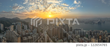 Jan 5 2025 Urban Skyline with Sunlit Horizon During Twilight Jan 5 2025 Urban Skyline with Sunlit Horizon During Twilight 122654765