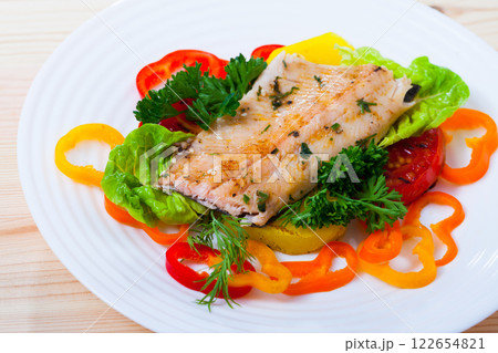 Delicious roasted juicy trout fillet Delicious roasted juicy trout fillet 122654821