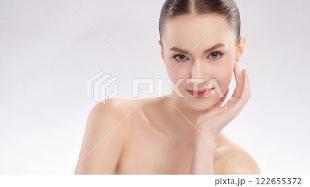 Beautiful young woman with clean fresh skin on white background, Face care, Facial treatment, Cosmetology, beauty and spa, women portrait. 122655372
