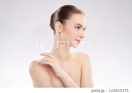 Beautiful young woman with clean fresh skin on white background, Face care, Facial treatment, Cosmetology, beauty and spa, women portrait. 122655375
