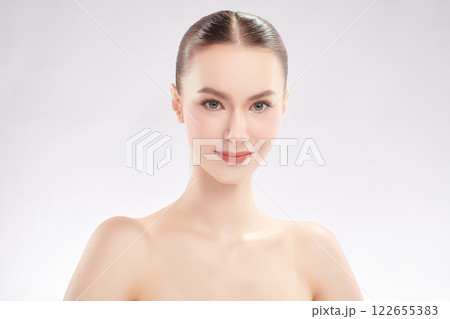 Beautiful young woman with clean fresh skin on white background, Face care, Facial treatment, Cosmetology, beauty and spa, women portrait. Beautiful young woman with clean fresh skin on white background, Face care, Facial treatment, Cosmetology, beauty and spa, women portrait. 122655383