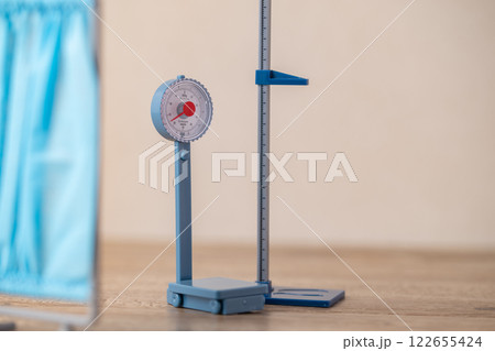 Toy weight scale and stadiometer. 122655424