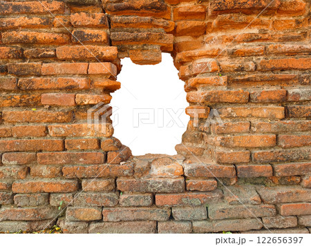 Hole in the ancient brick wall, ancient red brick texture. 122656397