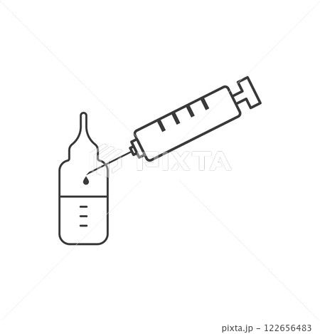 Syringe filling small bottle with medical liquid. 122656483