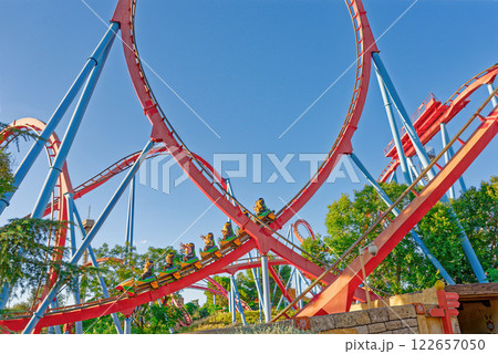 Roller Coaster in funny amusement park. Roller Coaster in funny amusement park. 122657050