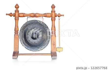 front view Antique Burmese Bronze Temple Gong with Mallet Mounted on Turned Wooden Stand on white background, object, buddha, thai, object, copy space 122657768
