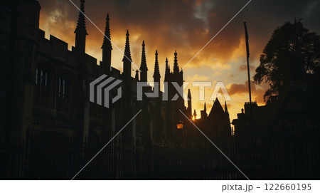 The grand library's towering columns and flying buttresses glow in twilight, creating an enchanting scene. The grand library's towering columns and flying buttresses glow in twilight, creating an enchanting scene. 122660195