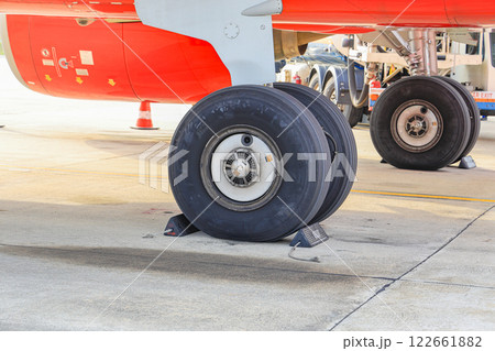 main landing gear of modern passenger aircraft taxi on taxi way. main landing gear of modern passenger aircraft taxi on taxi way. 122661882