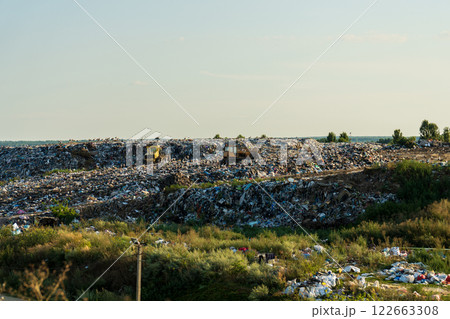 A large accumulation of garbage. Trash piles in landfill. Environment pollution 122663308